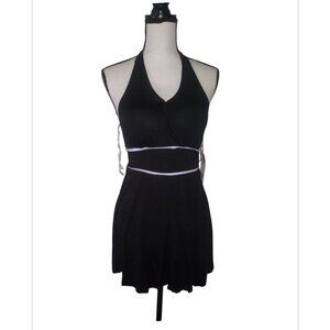 One piece skirt swimsuit with attached full coverage bottom.